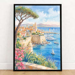 Antibes old town ramparts and harbour watercolour art print in a black frame on a wooden floor