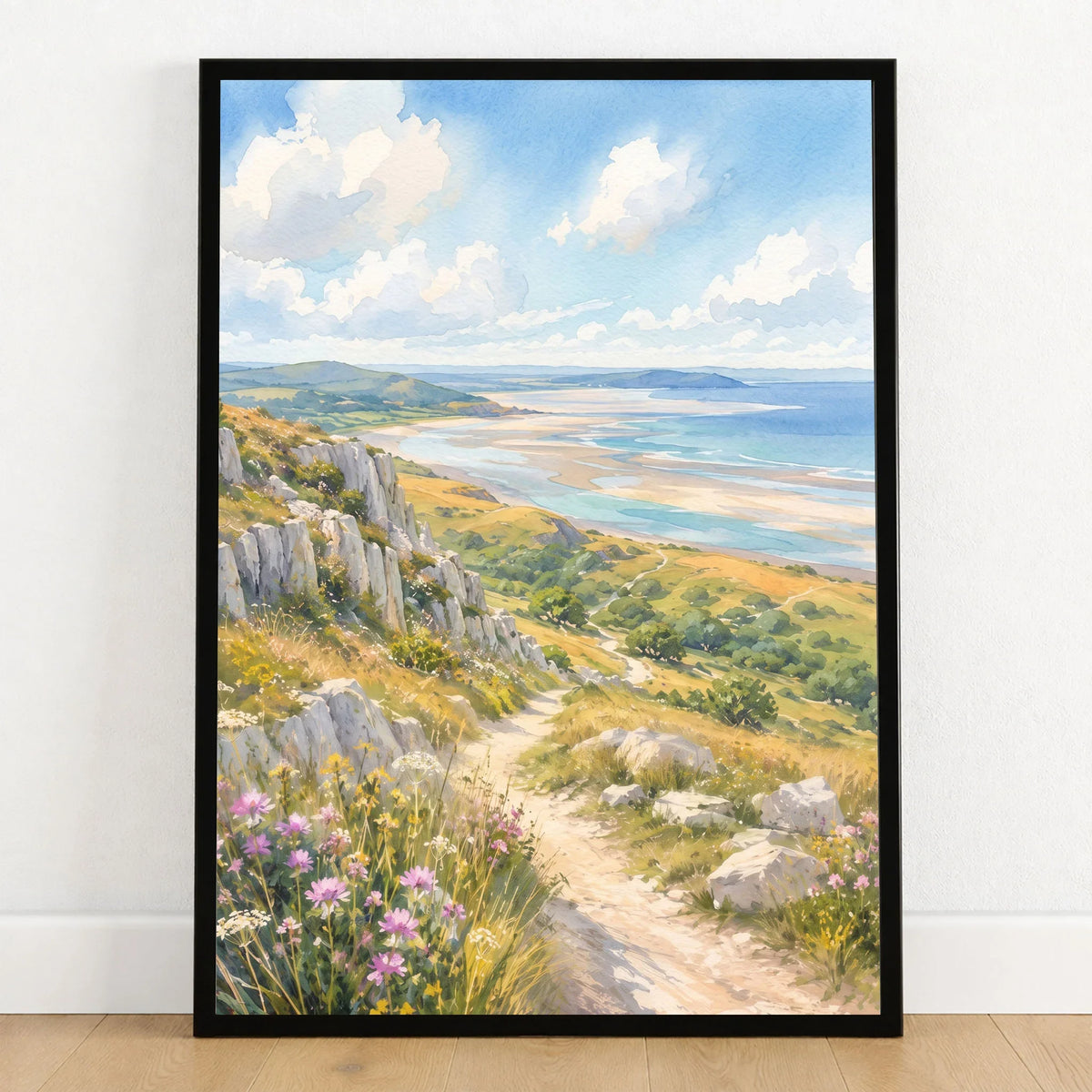 Arnside and Silverdale Morecambe Bay watercolour art print in a black frame on a wooden floor