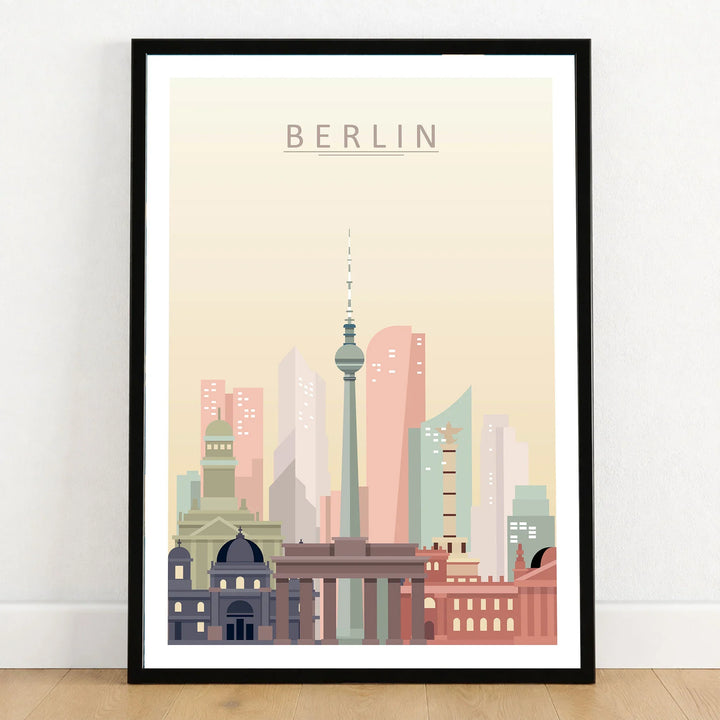 Berlin city skyline art print in a black frame on a wooden floor