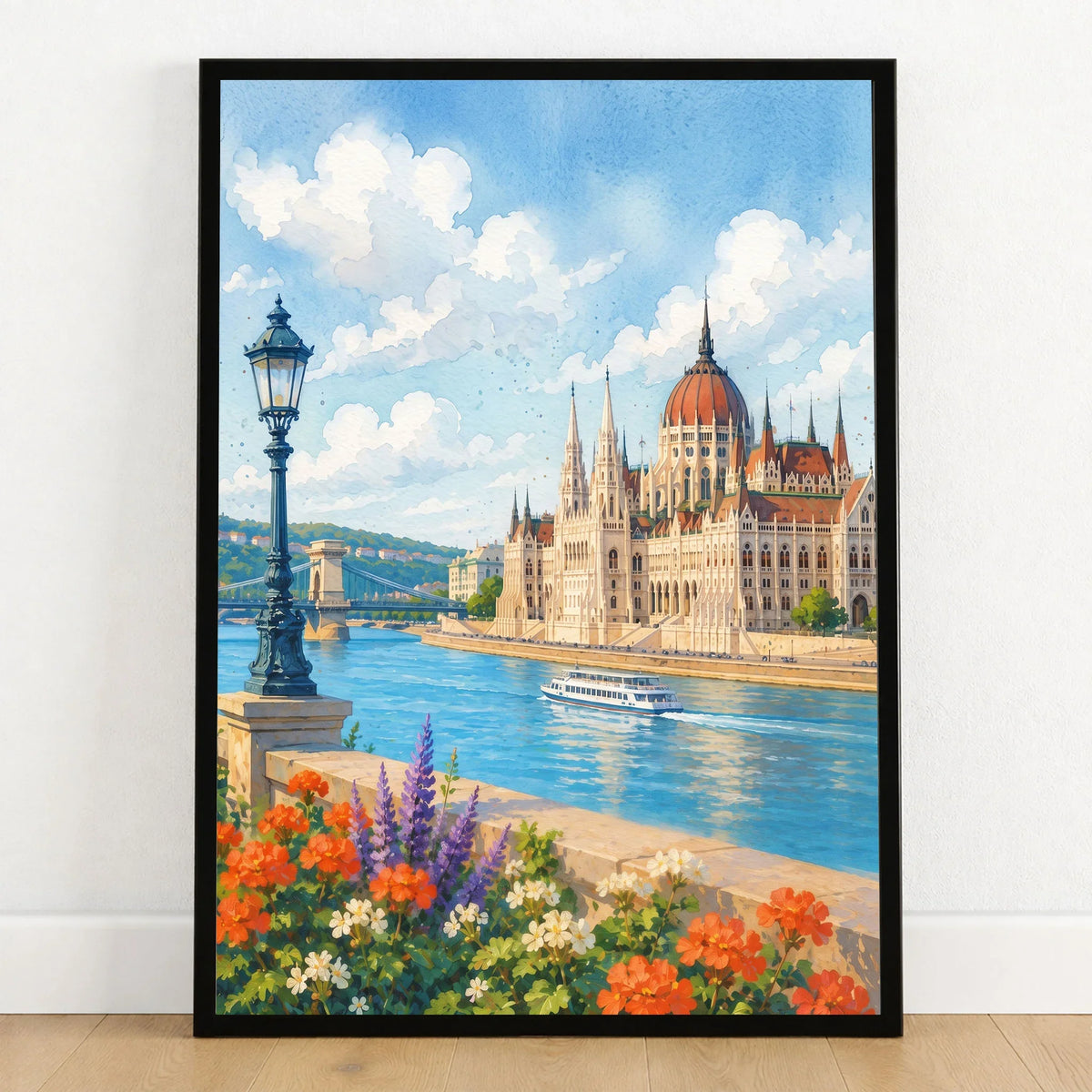 Budapest Parliament on the Danube watercolour art print in a black frame on a wooden floor