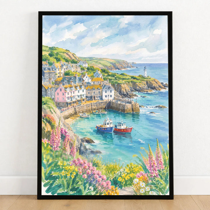 Cornwall harbour, fishing boats and lighthouse watercolour art print in a black frame on a wooden floor
