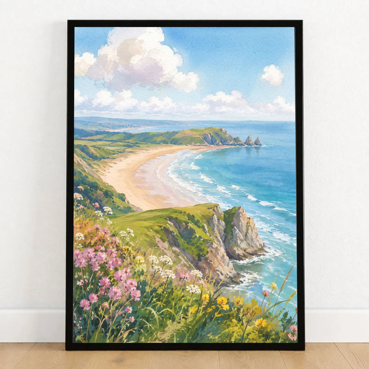 Gower sweeping bay and sea cliffs watercolour art print in a black frame on a wooden floor