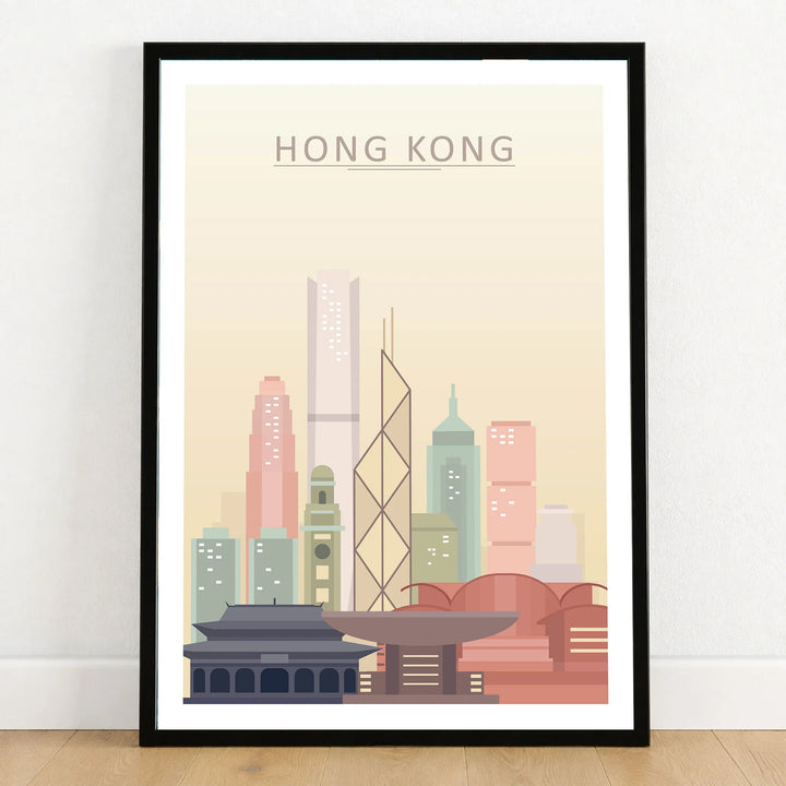 Hong Kong city skyline art print in a black frame on a wooden floor