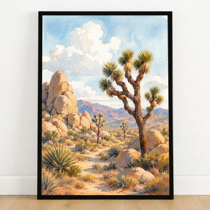 Joshua Tree National Park Joshua trees and granite boulders watercolour art print in a black frame on a wooden floor