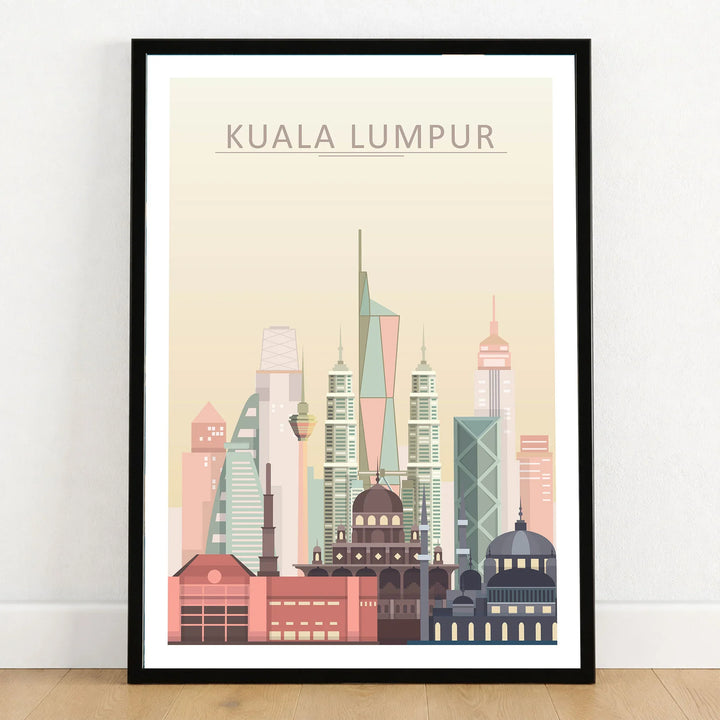 Kuala Lumpur city skyline art print in a black frame on a wooden floor