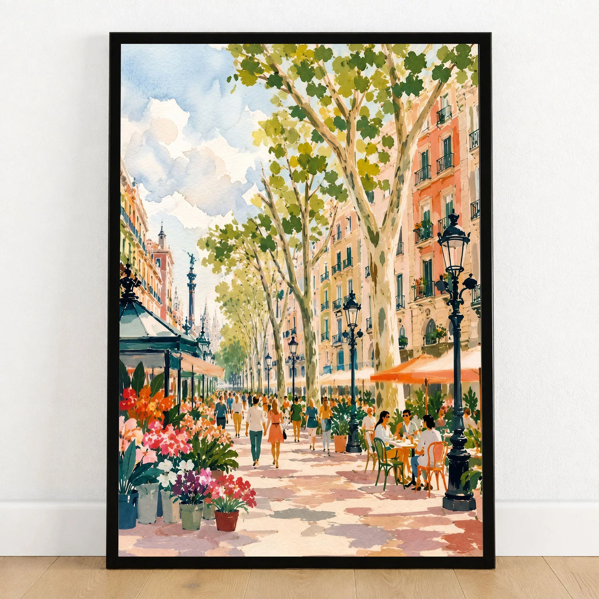 La Rambla Barcelona flower stalls and cafés watercolour art print in a black frame on a wooden floor