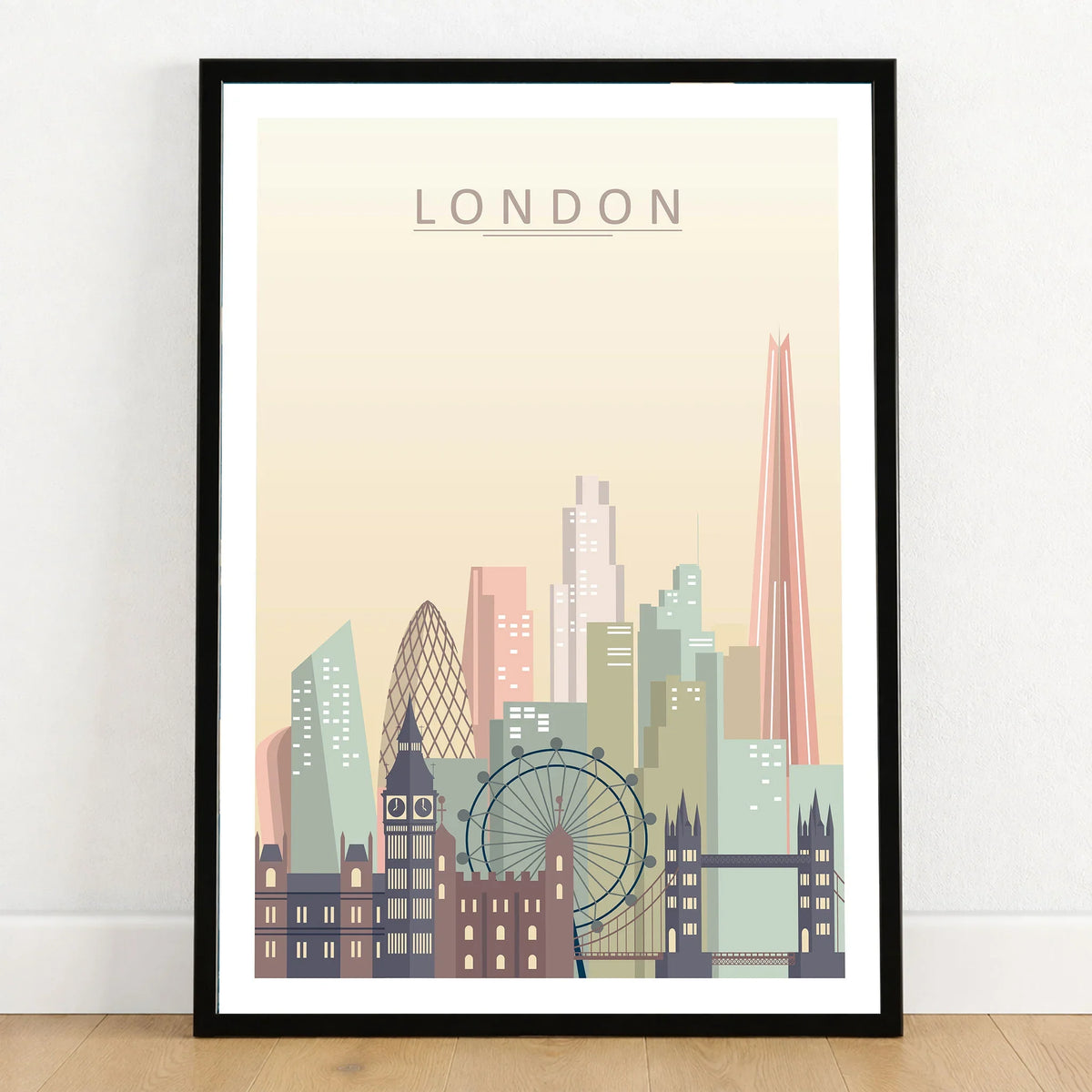 London city skyline art print in a black frame on a wooden floor
