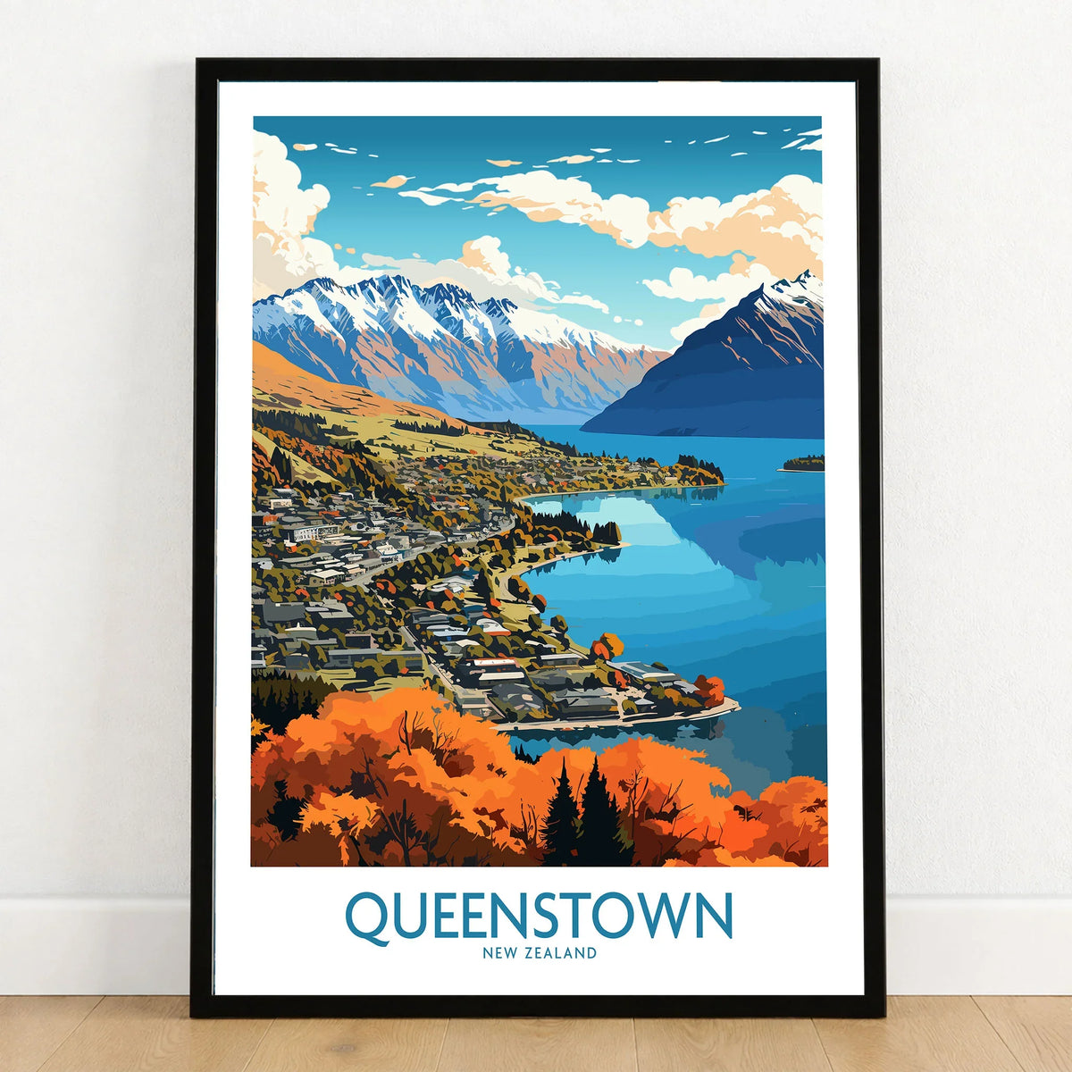 Queenstown New Zealand Lake Wakatipu in autumn modern travel poster in a black frame on a wooden floor