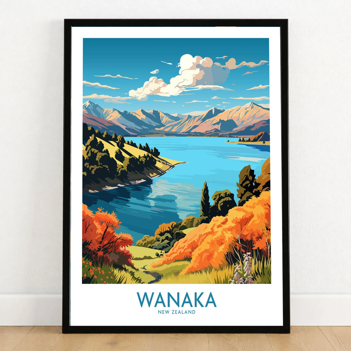 Wanaka Travel Poster New Zealand - framed art print in black frame on wooden floor