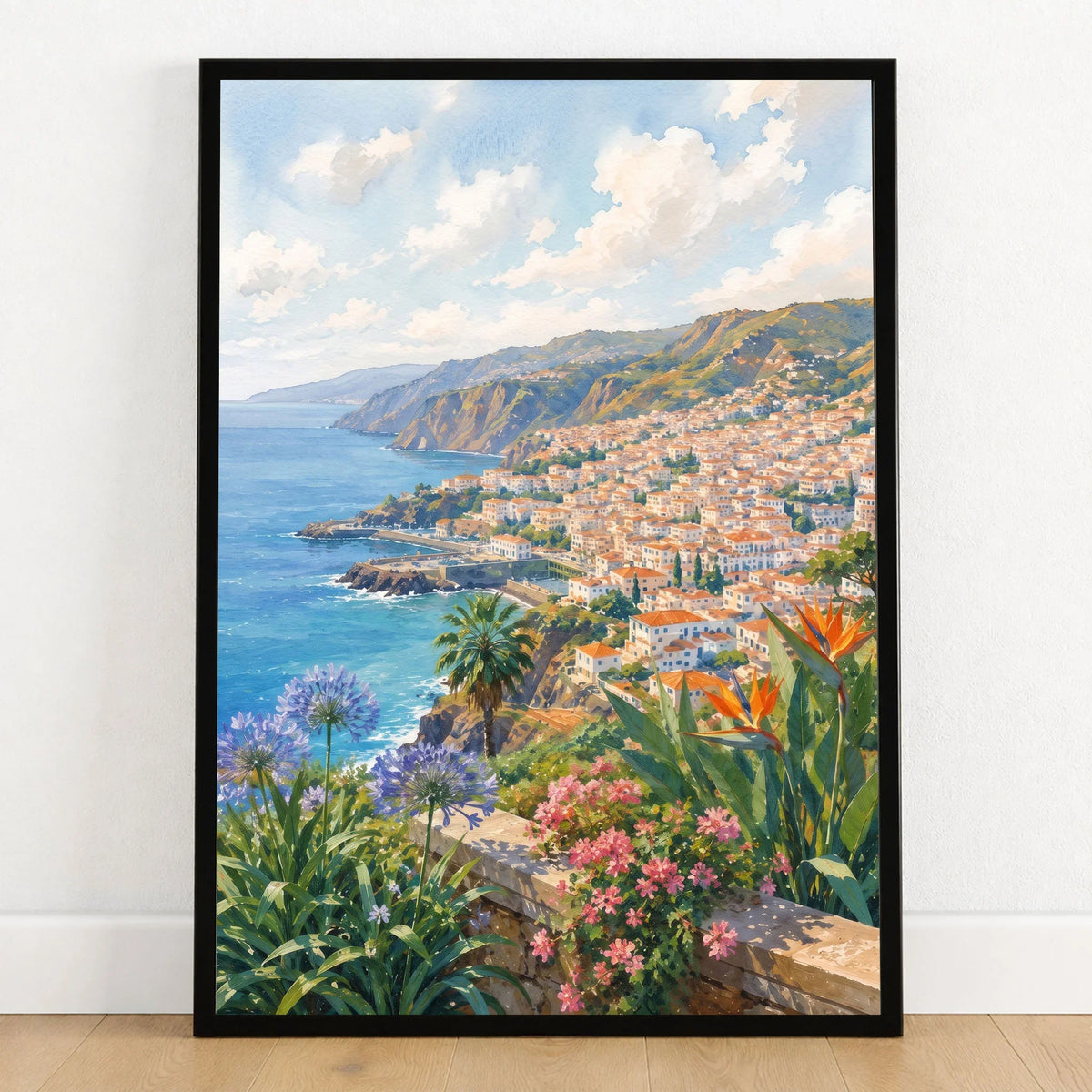 Madeira Funchal bay and coast watercolour art print in a black frame on a wooden floor