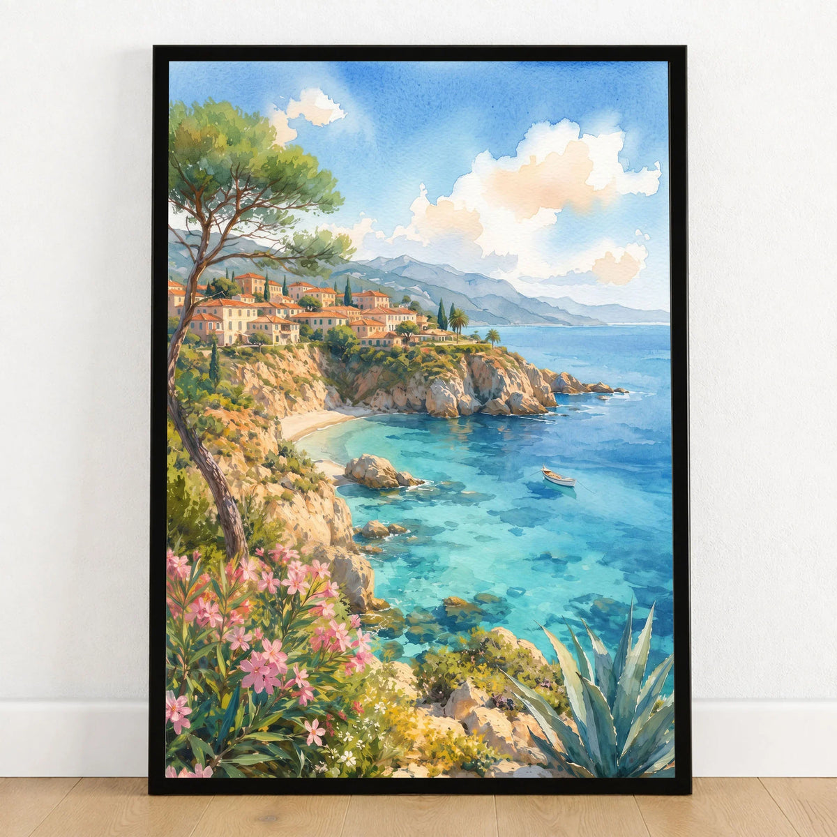 Mallorca turquoise cove and pines watercolour art print in a black frame on a wooden floor