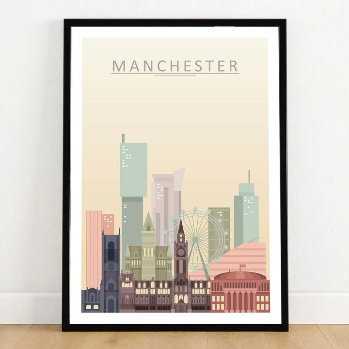Manchester city skyline art print in a black frame on a wooden floor