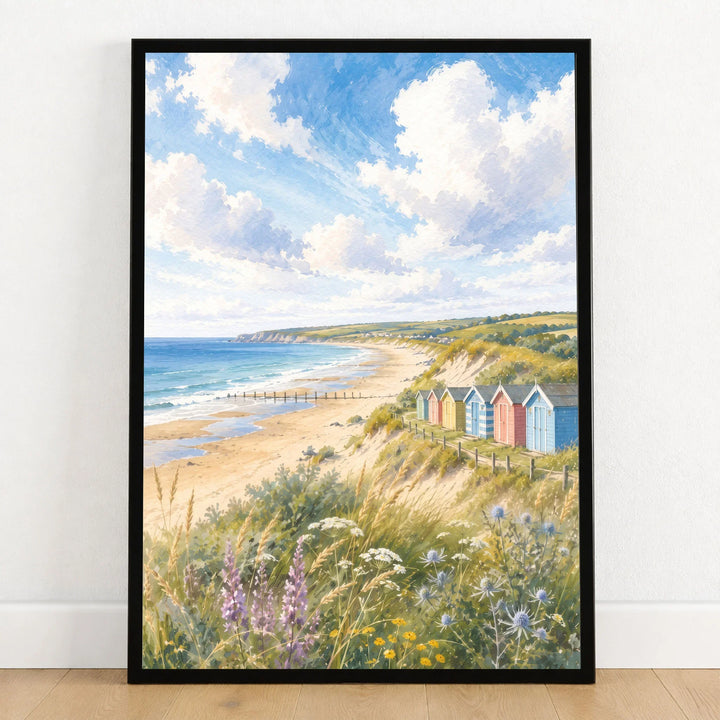 Norfolk Coast beach huts and sandy beach watercolour art print in a black frame on a wooden floor
