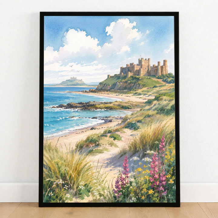 Northumberland Coast Bamburgh Castle and beach watercolour art print in a black frame on a wooden floor