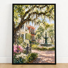Savannah Spanish moss oaks and park fountain watercolour art print in a black frame on a wooden floor