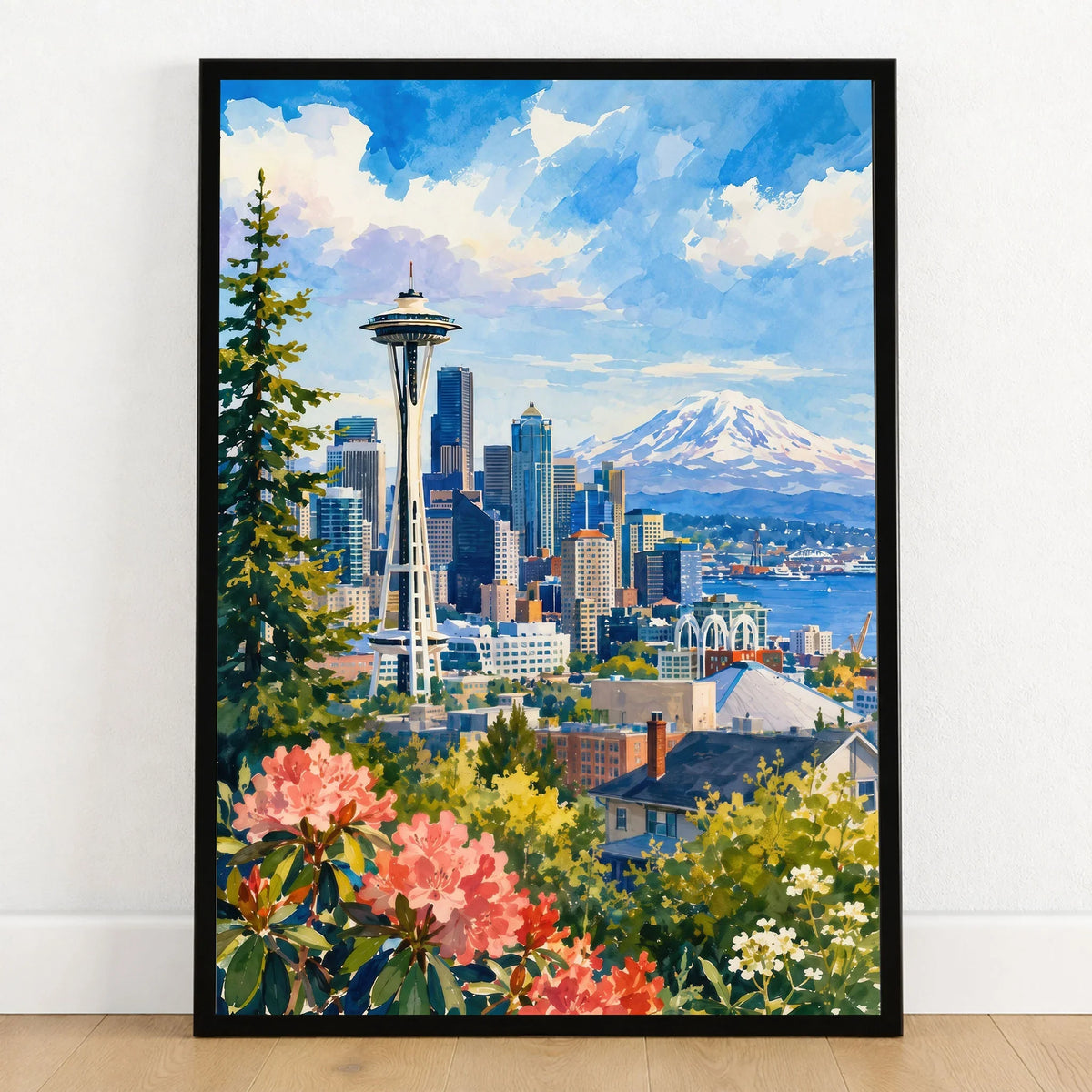 Seattle Space Needle and Mount Rainier watercolour art print in a black frame on a wooden floor