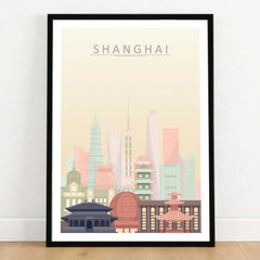 Shanghai city skyline art print in a black frame on a wooden floor