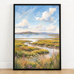Solway Coast salt marsh estuary watercolour art print in a black frame on a wooden floor