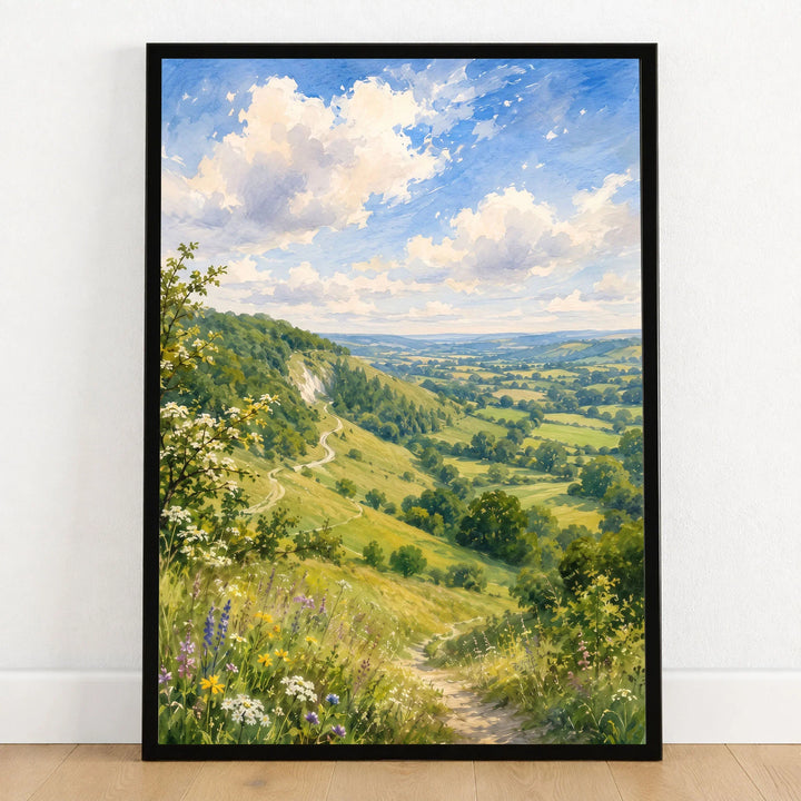 Surrey Hills wooded valley path watercolour art print in a black frame on a wooden floor