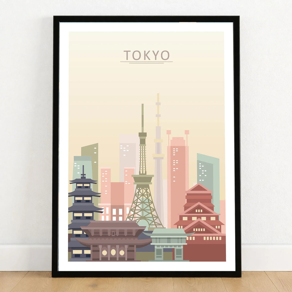 Tokyo city skyline art print in a black frame on a wooden floor