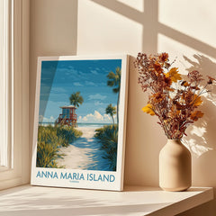 Anna Maria Island travel poster canvas print on windowsill with vase of dried flowers, sunlight and shadows.
