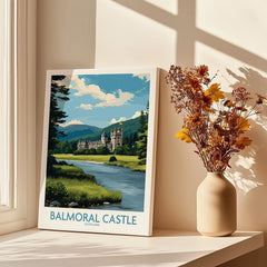 Balmoral Castle travel poster print on windowsill with sunlight and vase of dried flowers
