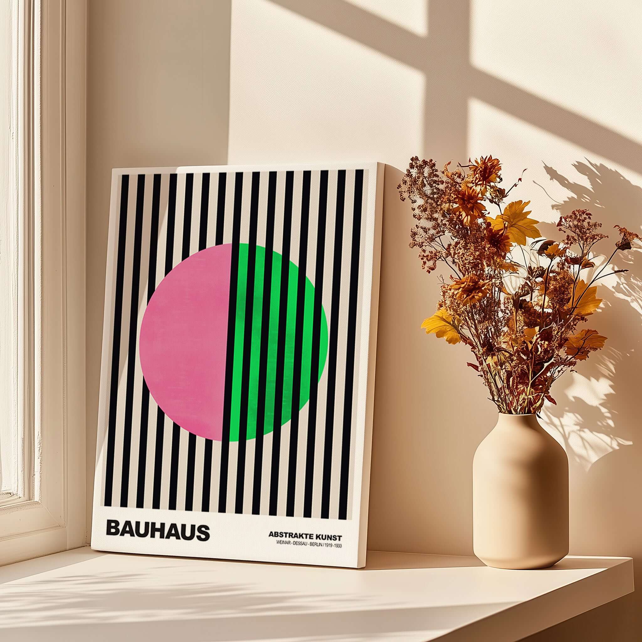 Bauhaus Exhibition Prints - Split Circle Abstract Art Print Pink Green Stripes displayed near flowers and sunlight.