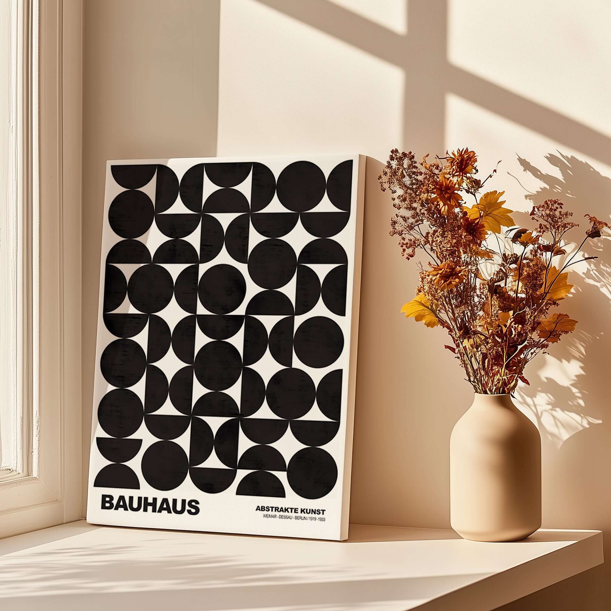 Bauhaus Exhibition Prints - Geometric Circle Shapes Art Print Black White Pattern displayed in natural light with flowers.