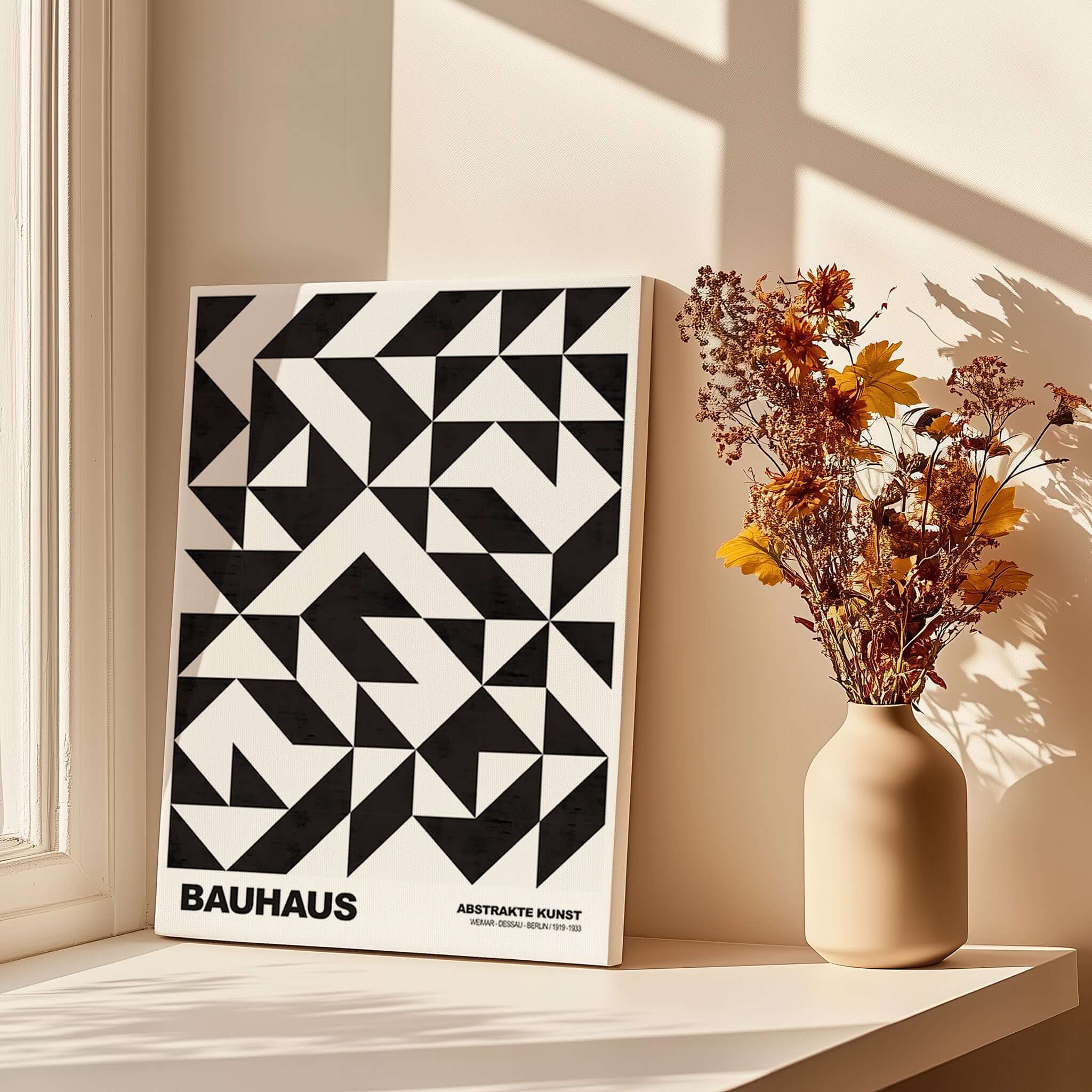 Bauhaus Exhibition Prints - Geometric Triangle Pattern Poster Black White Abstract displayed on a table with flowers.