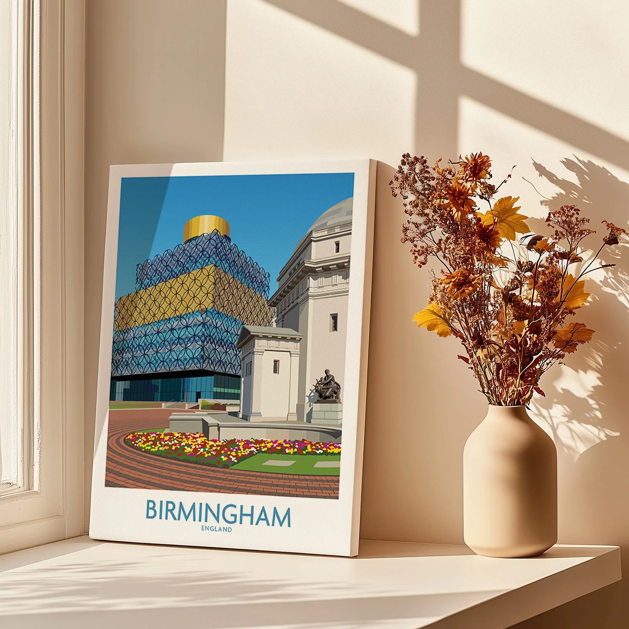 Birmingham travel poster canvas print on windowsill with vase of dried flowers in sunlight