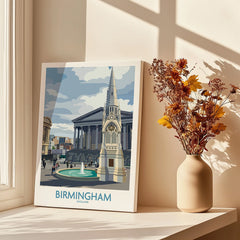 Birmingham city art print on windowsill with vase of dried flowers and sunlight shadows
