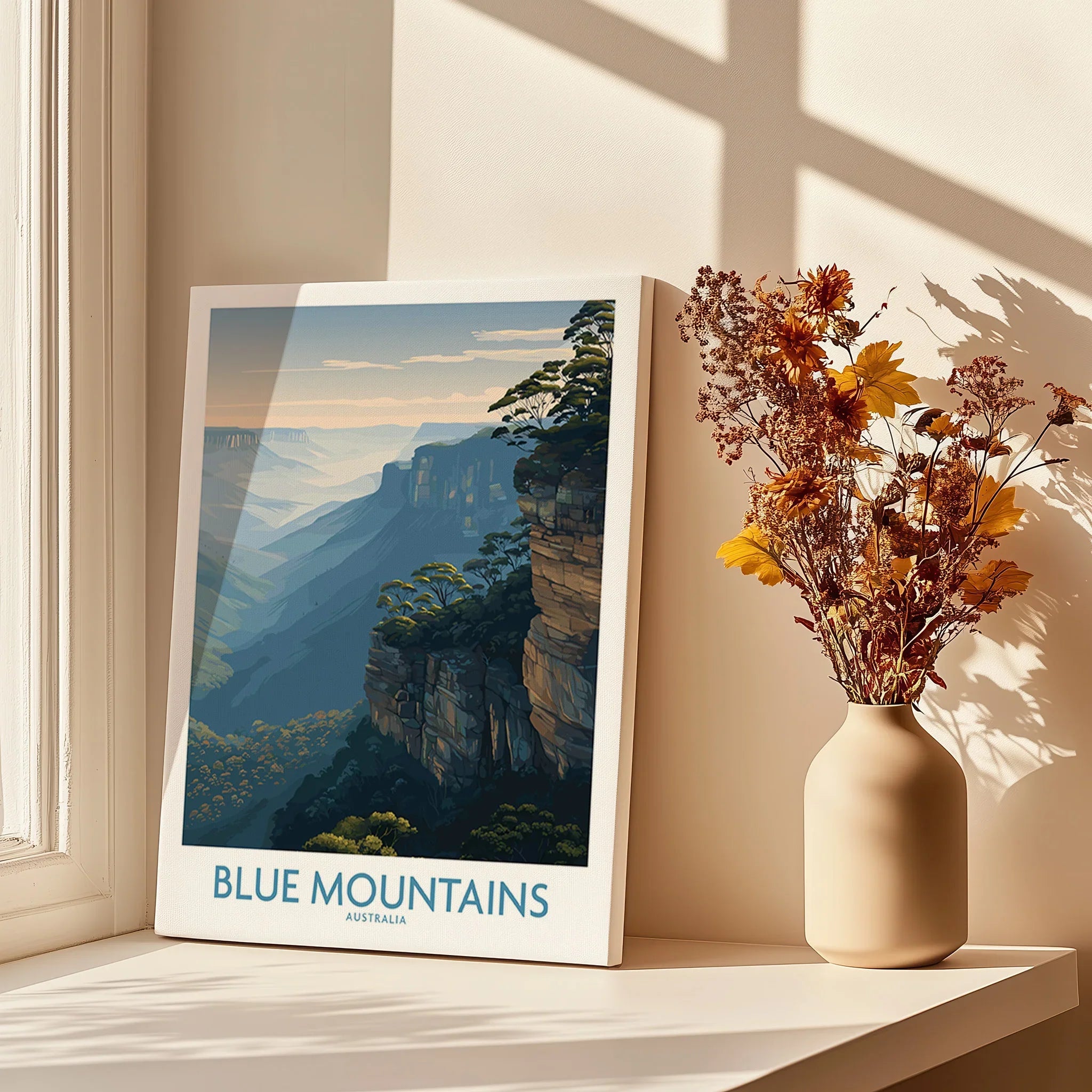 Blue Mountains Australia travel poster canvas print beside window with vase of dried flowers
