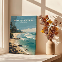 Burleigh Heads Australia Poster – Gold Coast Skyline & Iconic Surf Beach Wall Art displayed in a bright room near flowers.