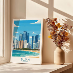 Busan South Korea skyline canvas print by window with vase of dried flowers in sunlight