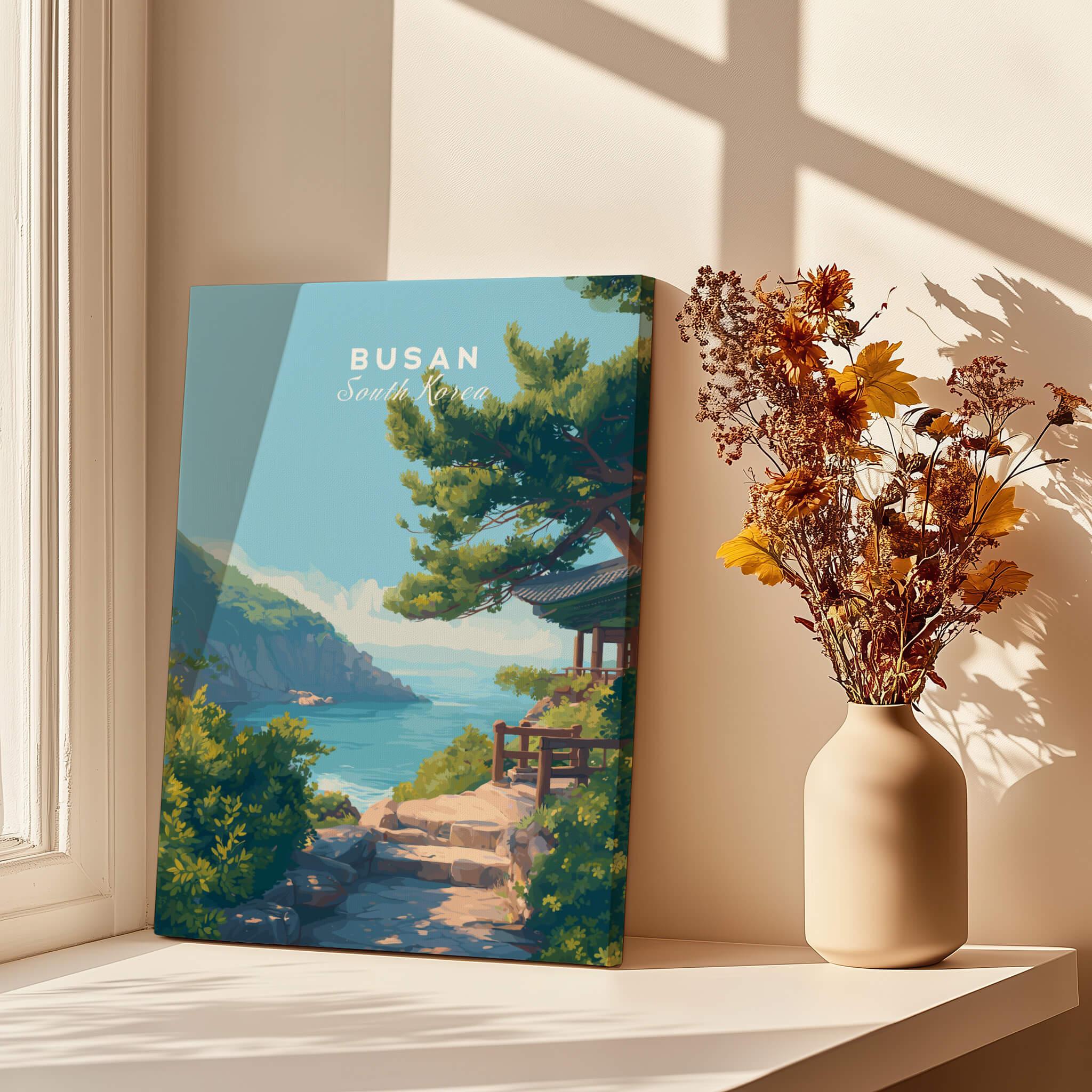 Busan South Korea travel poster canvas print on windowsill with vase of dried flowers
