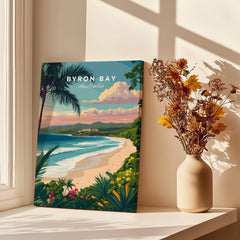 Byron Bay Australia Travel Poster featuring a scenic beach view with tropical plants and a lighthouse.