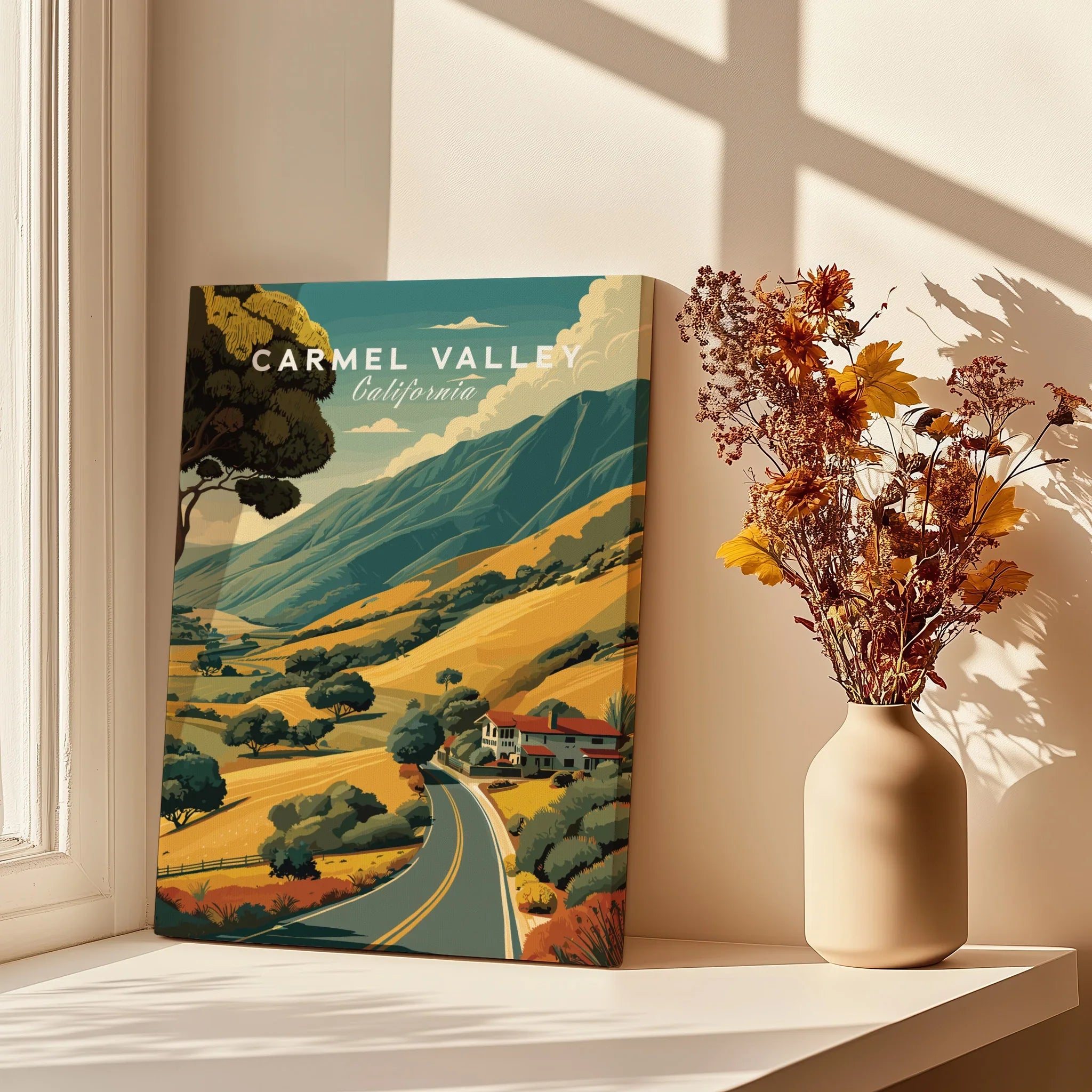 Carmel Valley California travel poster canvas print on windowsill with vase of dried flowers