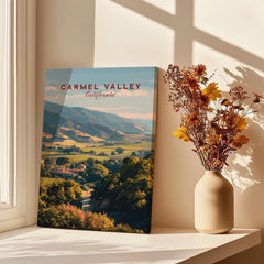 Carmel Valley California canvas print with landscape art beside a vase of dried flowers on a sunlit shelf