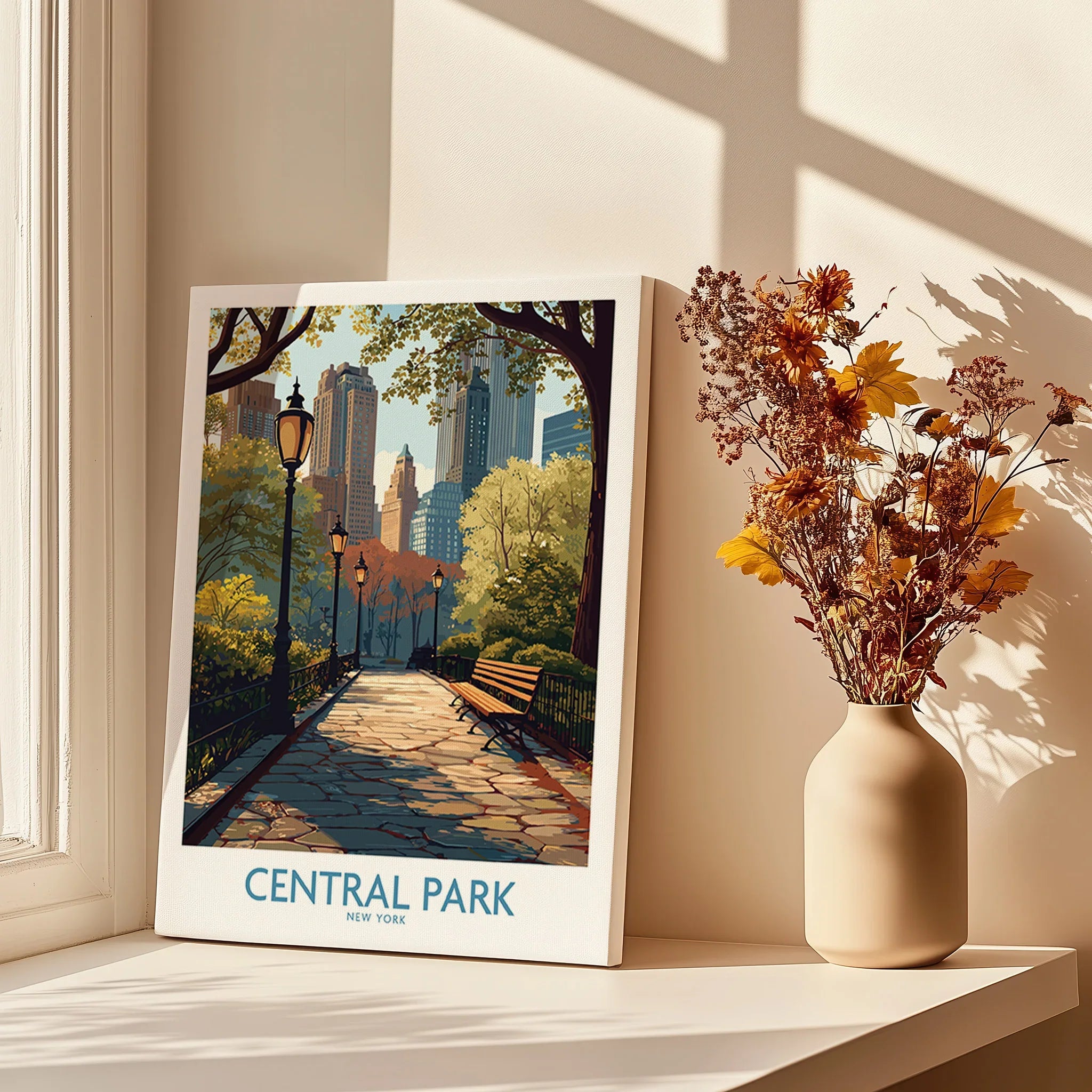 Central Park New York canvas art print displayed on a windowsill with vase of dried flowers