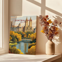 Central Park New York art print with skyline, autumn trees, and bridge beside vase of dried flowers