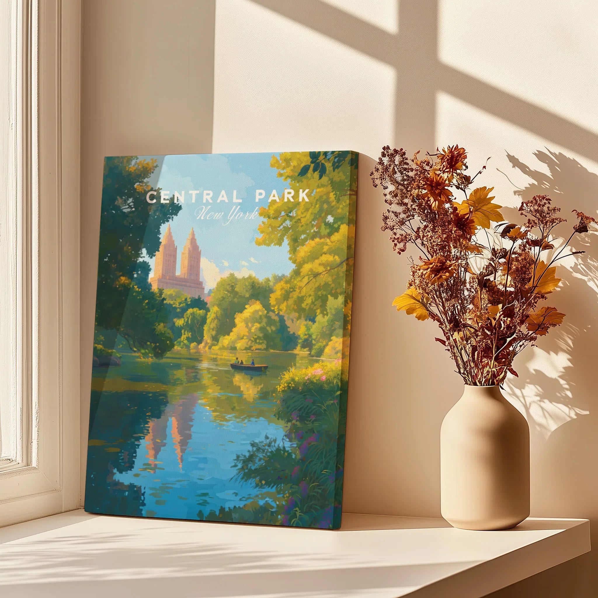 Central Park New York art print on windowsill with vase of dried flowers and sunlight shadows