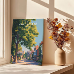 Colchester England travel poster canvas print by window with vase of dried flowers