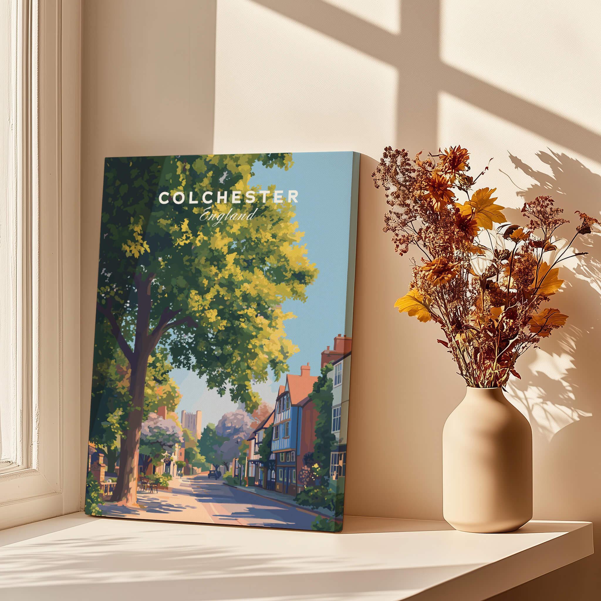 Colchester England travel poster canvas print by window with vase of dried flowers