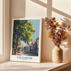 Colchester England travel poster canvas print on windowsill with vase of dried flowers