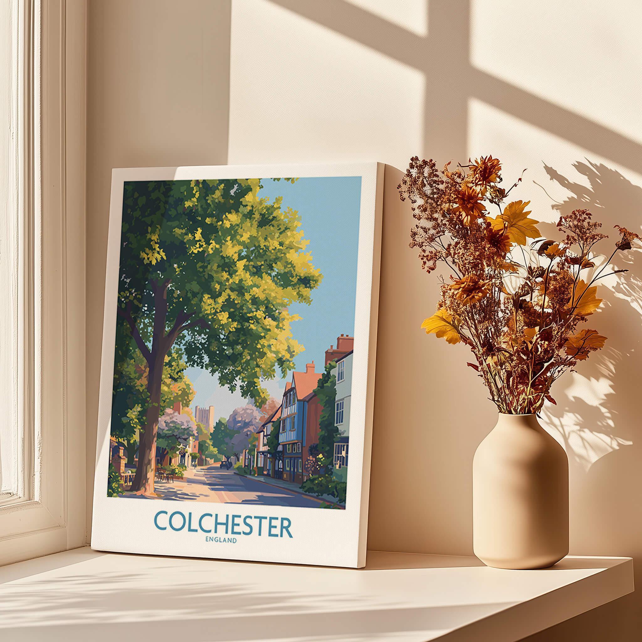 Colchester England travel poster canvas print on windowsill with vase of dried flowers