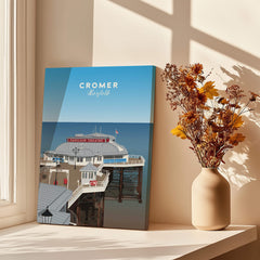 Cromer Travel Poster – Norfolk Pier & Pavilion Theatre Landmark Art displayed next to a vase with flowers.