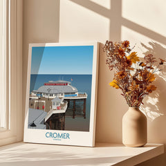 Cromer Norfolk Wall Art – Historic Seaside Pier Art Print displayed beside flowers in a vase, highlighting its nautical charm.