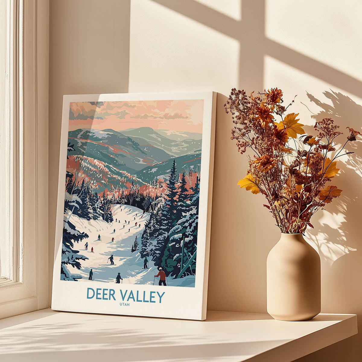 Deer Valley Travel Poster - Utah displayed on a table beside a vase with flowers and sunlight streaming in.