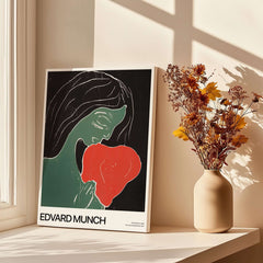 Edvard Munch Art Print - Edvard Munch Two Heart c1899 Woodcut - Symbolist Love Poster displayed by a window with flowers.