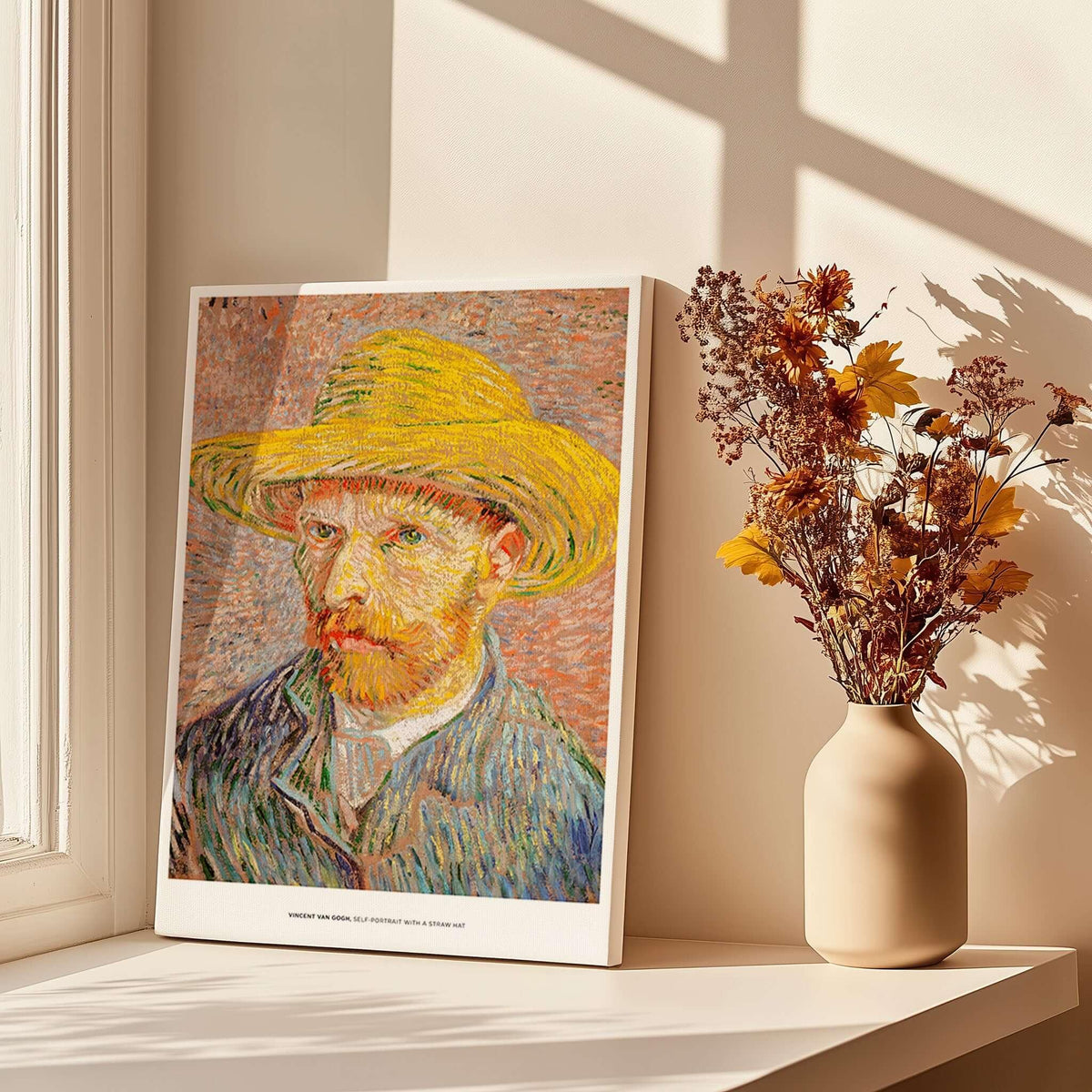 Vincent van Gogh Self Portrait Straw Hat Post-Impressionist Art Print Poster displayed beside a vase with dried flowers.
